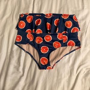 Kortni Jeane Oranges Ruffle Bottom